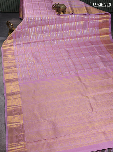 Pure kanchipuram silk saree pastel pink with allover veldhari zari weaves and rich zari woven border