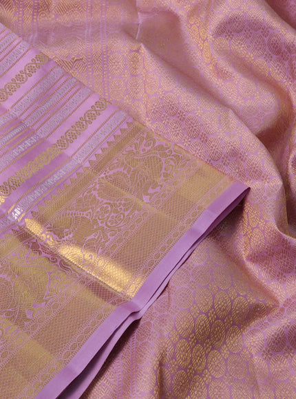 Pure kanchipuram silk saree pastel pink with allover veldhari zari weaves and rich zari woven border