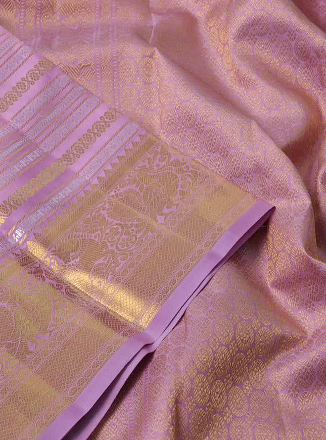 Pure kanchipuram silk saree pastel pink with allover veldhari zari weaves and rich zari woven border