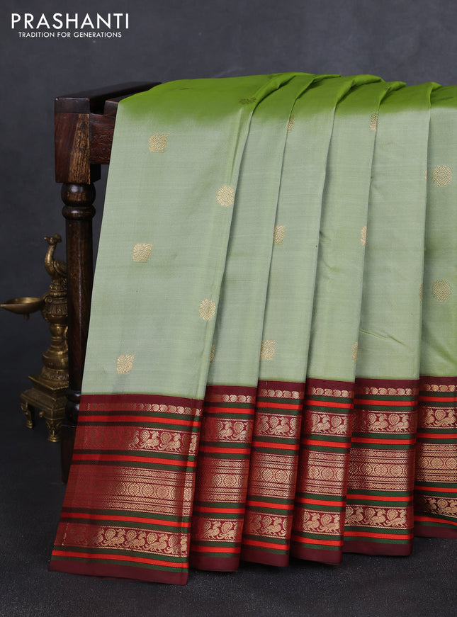 Pure kanchipuram silk saree pastel green and deep maroon with zari woven buttas and rich zari woven korvai border