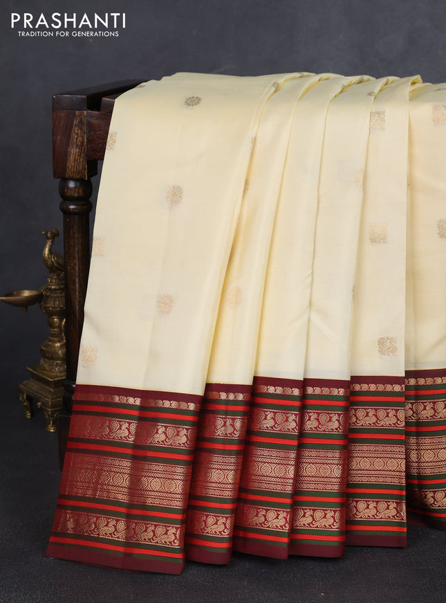 Pure kanchipuram silk saree cream and deep maroon with zari woven buttas and rich zari woven korvai border