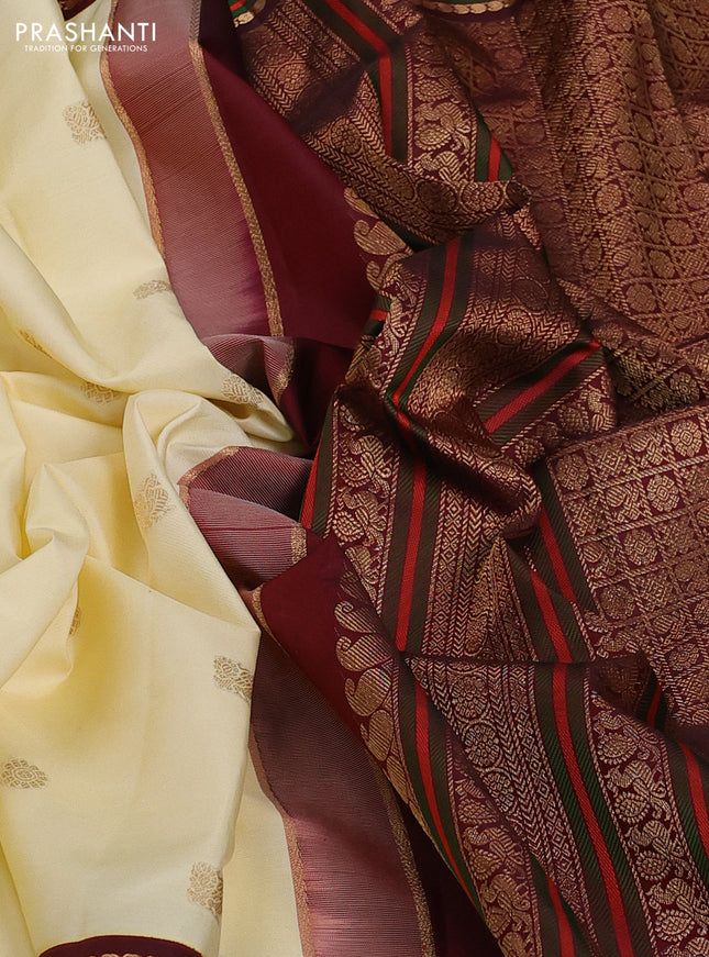 Pure kanchipuram silk saree cream and deep maroon with zari woven buttas and rich zari woven korvai border