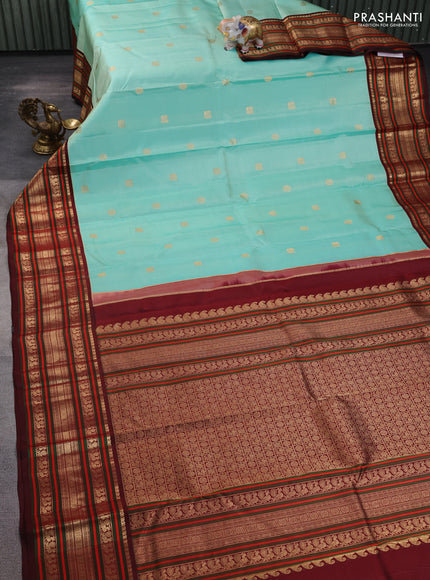 Pure kanchipuram silk saree teal blue and deep maroon with zari woven buttas and rich zari woven korvai border