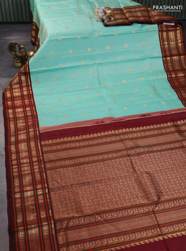 Pure kanchipuram silk saree teal blue and deep maroon with zari woven buttas and rich zari woven korvai border