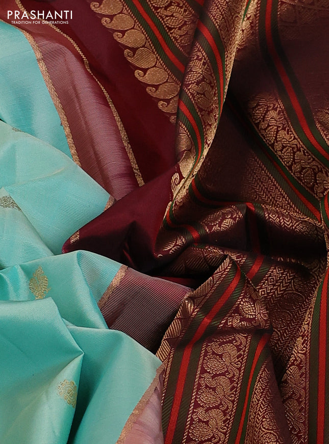 Pure kanchipuram silk saree teal blue and deep maroon with zari woven buttas and rich zari woven korvai border