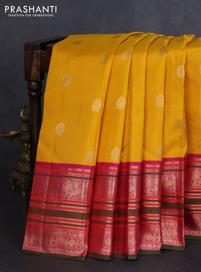 Pure kanchipuram silk saree yellow and pink with zari woven buttas and long zari woven korvai border