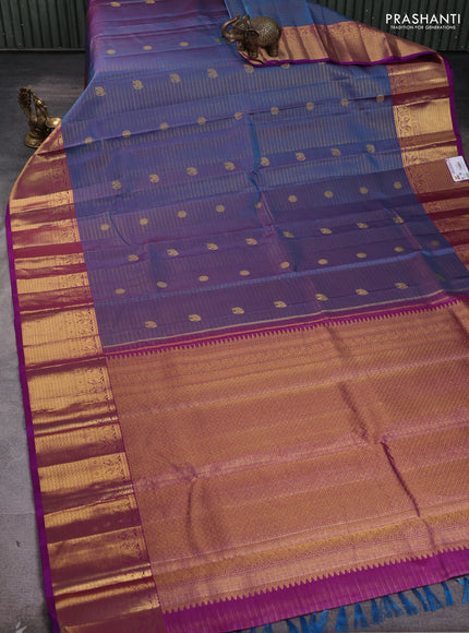 Pure kanchipuram silk saree dual shade of peacock blue and purple with allover vairosi pattern & zari buttas and rich zari woven border