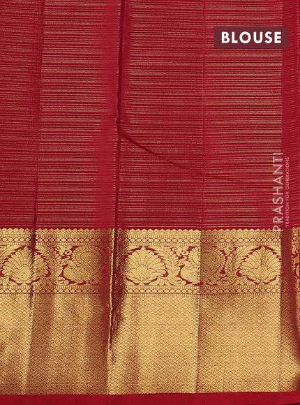 Pure kanchipuram silk saree dual shade of bottle green and kumkum red with allover vairosi pattern & zari buttas and rich zari woven border