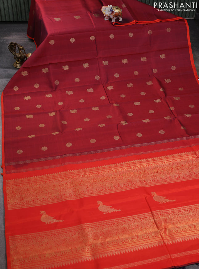 Pure kanchipuram silk saree maroon and orange with annam & rudhraksha zari woven buttas and piping border
