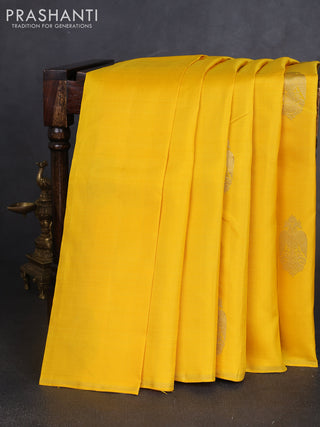Pure kanchipuram silk saree yellow and deep maroon with zari woven buttas in borderless style