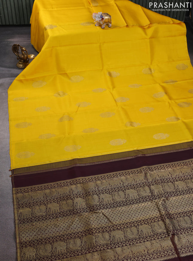 Pure kanchipuram silk saree yellow and deep maroon with zari woven buttas in borderless style