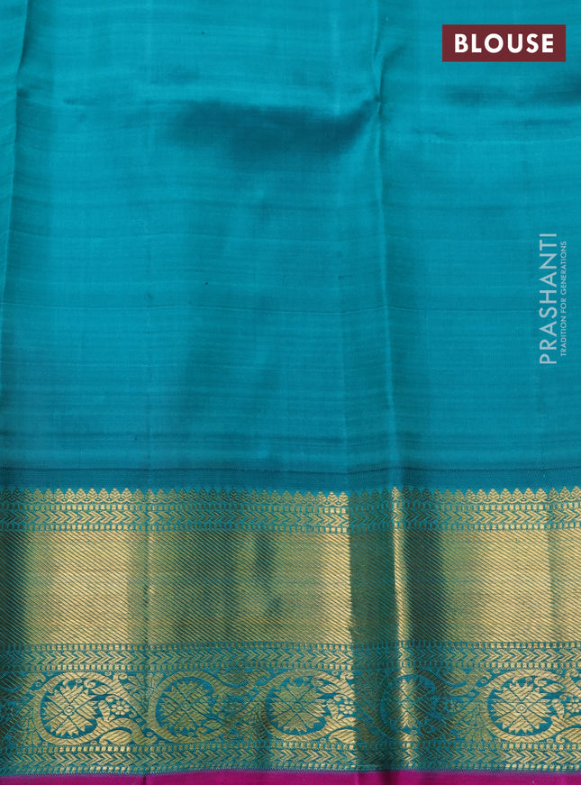 Pure kanchipuram silk saree pastel orange and teal green with zari woven buttas and zari woven korvai border