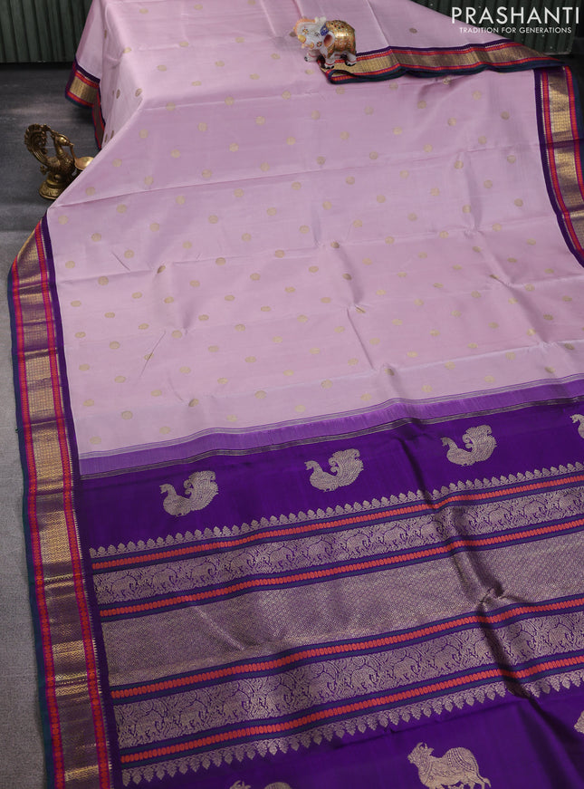 Pure kanchipuram silk saree pastel pink and violet with zari woven buttas and zari woven korvai border