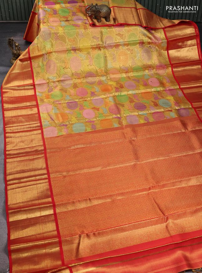 Pure kanchipuram tissue silk saree gold and red with allover zari woven brocade weaves and long zari woven border