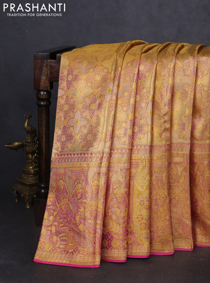 Pure kanchipuram tissue silk saree gold and golden pink with allover zari woven brocade weaves and long zari woven border