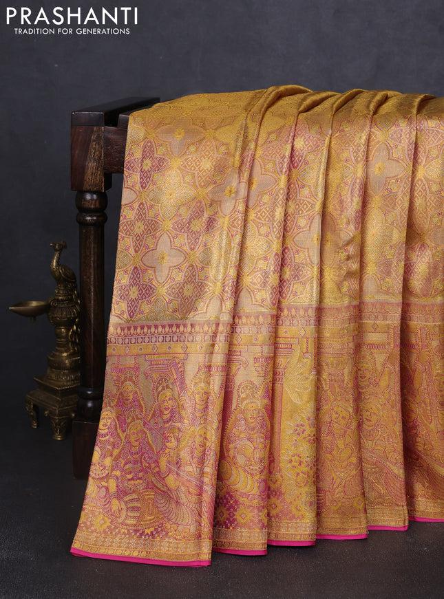 Pure kanchipuram tissue silk saree gold and golden pink with allover zari woven brocade weaves and long zari woven border