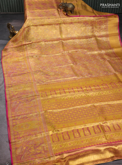 Pure kanchipuram tissue silk saree gold and golden pink with allover zari woven brocade weaves and long zari woven border