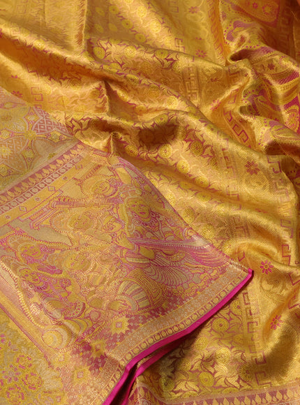 Pure kanchipuram tissue silk saree gold and golden pink with allover zari woven brocade weaves and long zari woven border