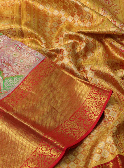 Pure kanchipuram tissue silk saree dual shade of golden pink and red with allover parrot zari woven brocade weaves and long zari woven border