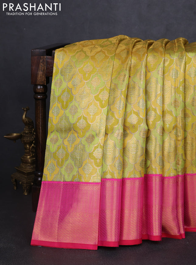 Pure kanchipuram tissue silk saree gold lime yellow and pink with allover zari woven brocade weaves and rich zari woven korvai border
