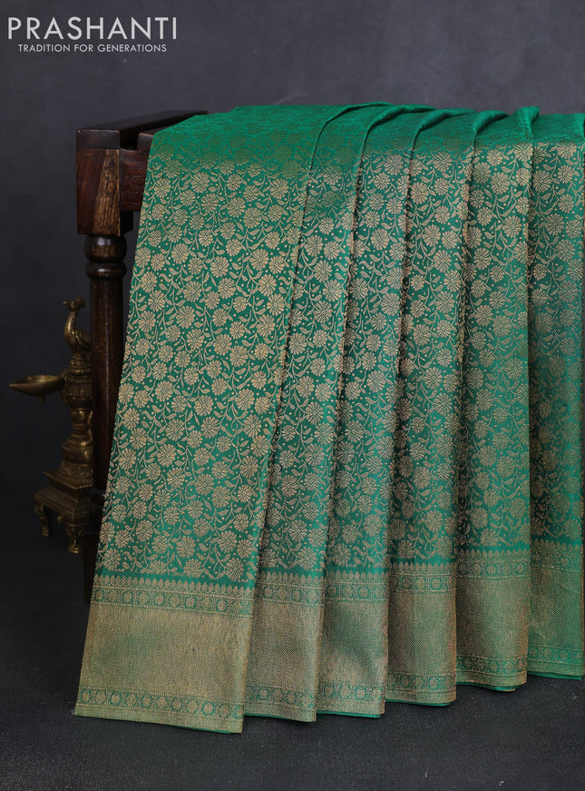 Pure kanchipuram silk saree green with allover zari woven brocade weaves and krishnar weaving pallu