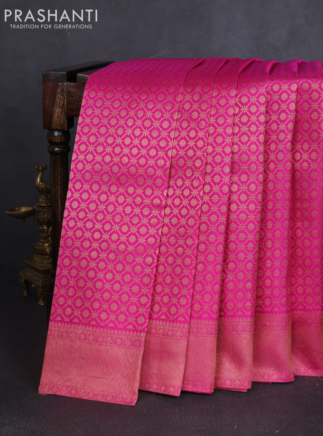 Pure kanchipuram silk saree rani pink with allover zari woven brocade weaves and krishnar weaving pallu