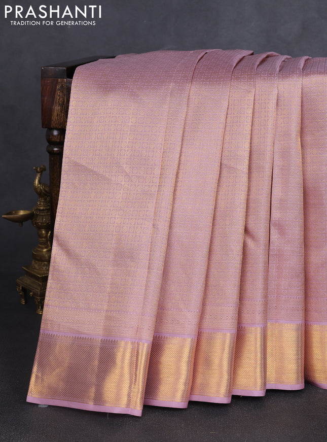 Pure kanchipuram silk saree pastel pink with allover zari woven brocade weaves and zari woven border