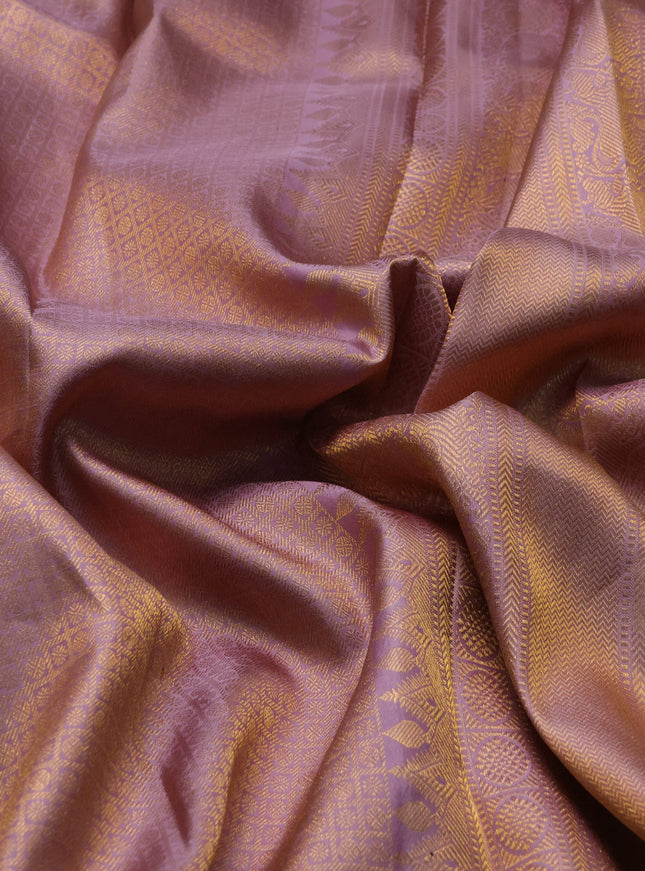 Pure kanchipuram silk saree pastel pink with allover zari woven brocade weaves and zari woven border