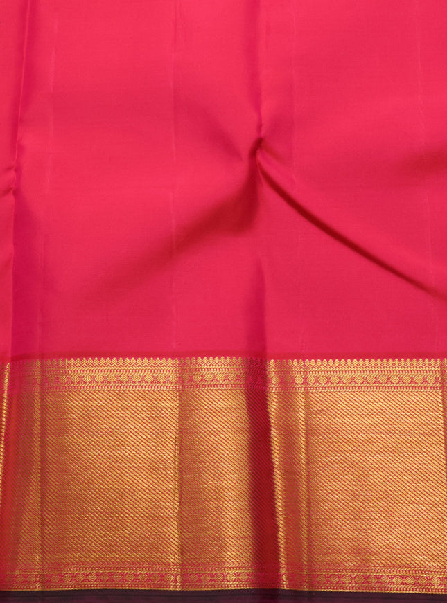 Pure kanchipuram silk saree dual shade of pinkish orange with allover zari woven brocade weaves and rich zari woven border
