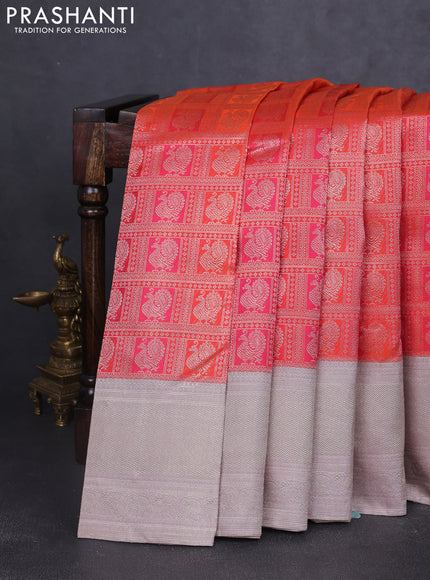 Pure kanchipuram silk saree orange and grey with allover zari woven annam brocade weaves and rich banarasi style border