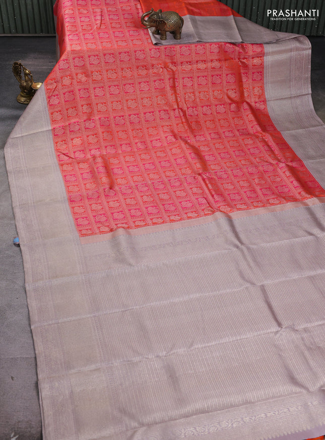 Pure kanchipuram silk saree orange and grey with allover zari woven annam brocade weaves and rich banarasi style border