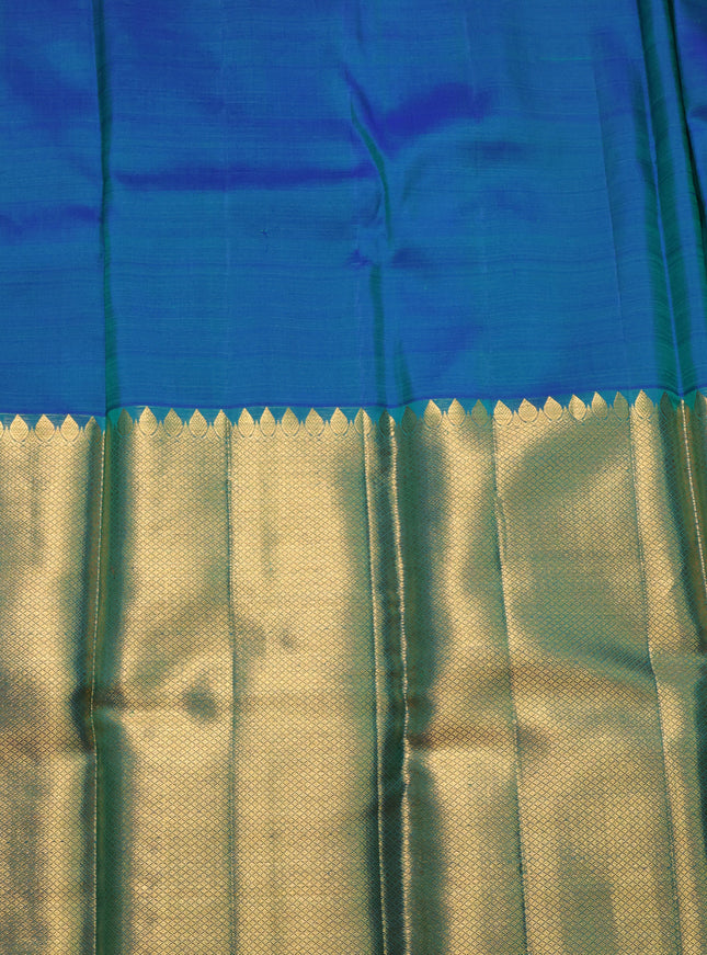 Pure kanchipuram silk saree blue and green with allover mina weaves and long zari woven border