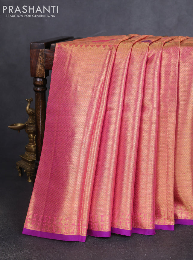 Pure kanchipuram silk saree peach shade with allover mina weaves and long zari woven border
