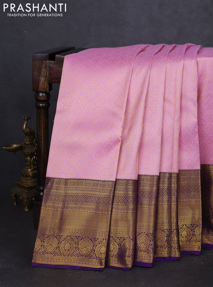 Pure kanchipuram silk saree lotus pink and deep violet with allover zari woven brocade weaves and long rich zari woven border