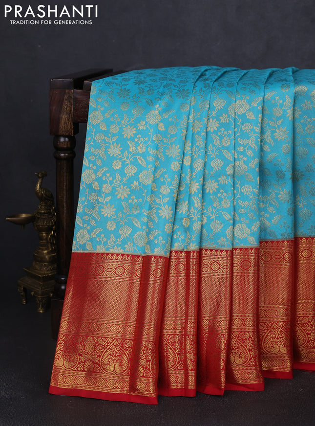 Pure kanchipuram silk saree light blue and red with allover zari woven brocade weaves and long rich zari woven border