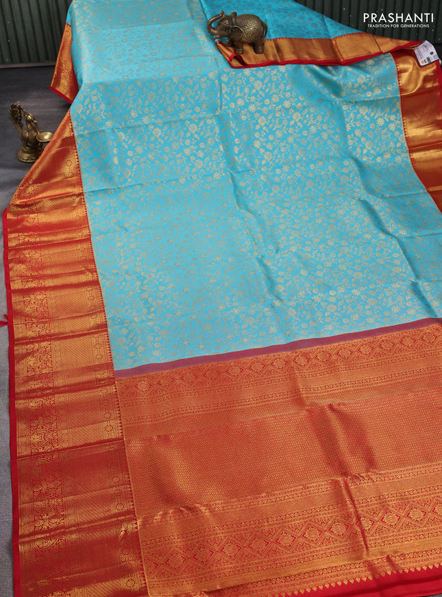 Pure kanchipuram silk saree light blue and red with allover zari woven brocade weaves and long rich zari woven border