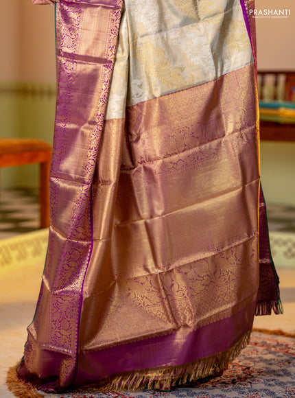 Pure tissue kanchipuram silk saree elaichi green and purple with allover silver & gold zari leheriya weaves and long rich zari woven korvai border