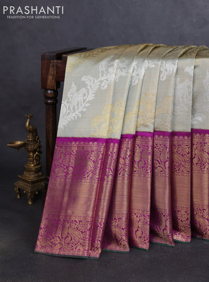 Pure tissue kanchipuram silk saree elaichi green and purple with allover silver & gold zari leheriya weaves and long rich zari woven korvai border