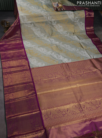 Pure tissue kanchipuram silk saree elaichi green and purple with allover silver & gold zari leheriya weaves and long rich zari woven korvai border