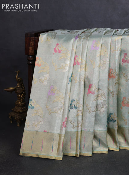Pure tissue kanchipuram silk saree pastel green shade with allover zari weaves and zari woven muniya butta border