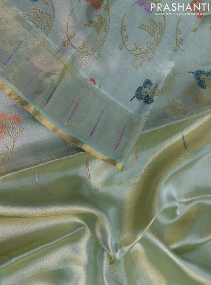 Pure tissue kanchipuram silk saree pastel green shade with allover zari weaves and zari woven muniya butta border