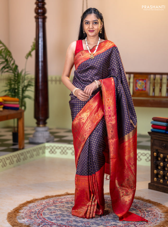 Pure kanchipuram silk saree deep purple and red with allover zari woven butta weaves and long zari woevn paithani style border