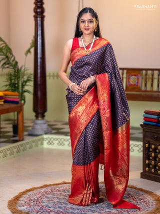 Pure kanchipuram silk saree deep purple and red with allover zari woven butta weaves and long zari woevn paithani style border