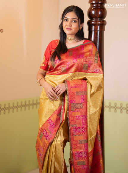 Pure tissue kanchipuram silk saree gold and maroon with allover zari woven butta weaves and long zari woevn paithani style border