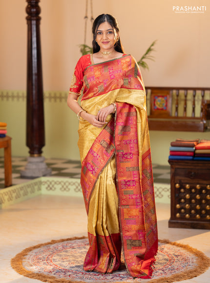 Pure tissue kanchipuram silk saree gold and maroon with allover zari woven butta weaves and long zari woevn paithani style border