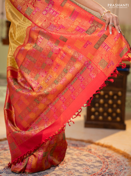 Pure tissue kanchipuram silk saree gold and maroon with allover zari woven butta weaves and long zari woevn paithani style border