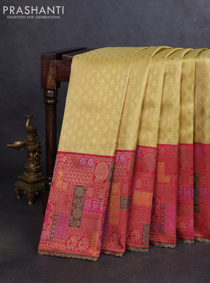 Pure tissue kanchipuram silk saree gold and maroon with allover zari woven butta weaves and long zari woevn paithani style border