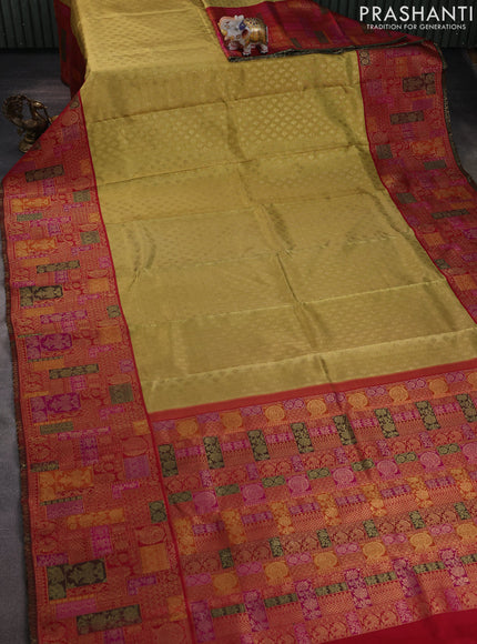 Pure tissue kanchipuram silk saree gold and maroon with allover zari woven butta weaves and long zari woevn paithani style border