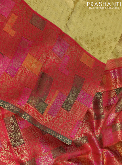 Pure tissue kanchipuram silk saree gold and maroon with allover zari woven butta weaves and long zari woevn paithani style border