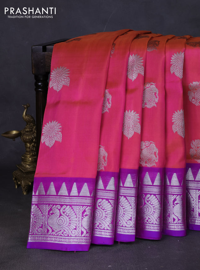 Venkatagiri silk saree dual shade of pinkish orange and purple with silver zari woven buttas and silver zari woven border